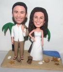 Custom beach theme wedding cake topper