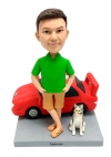 Custom bobblehead beside a car standing by the car doll for him