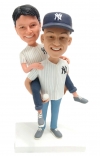 Custom bobble heads dolls gay bobbleheads one carrying another