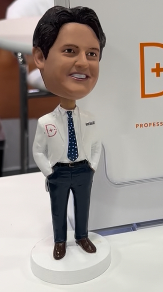 60x the Dr Dennis Gross bobbleheads